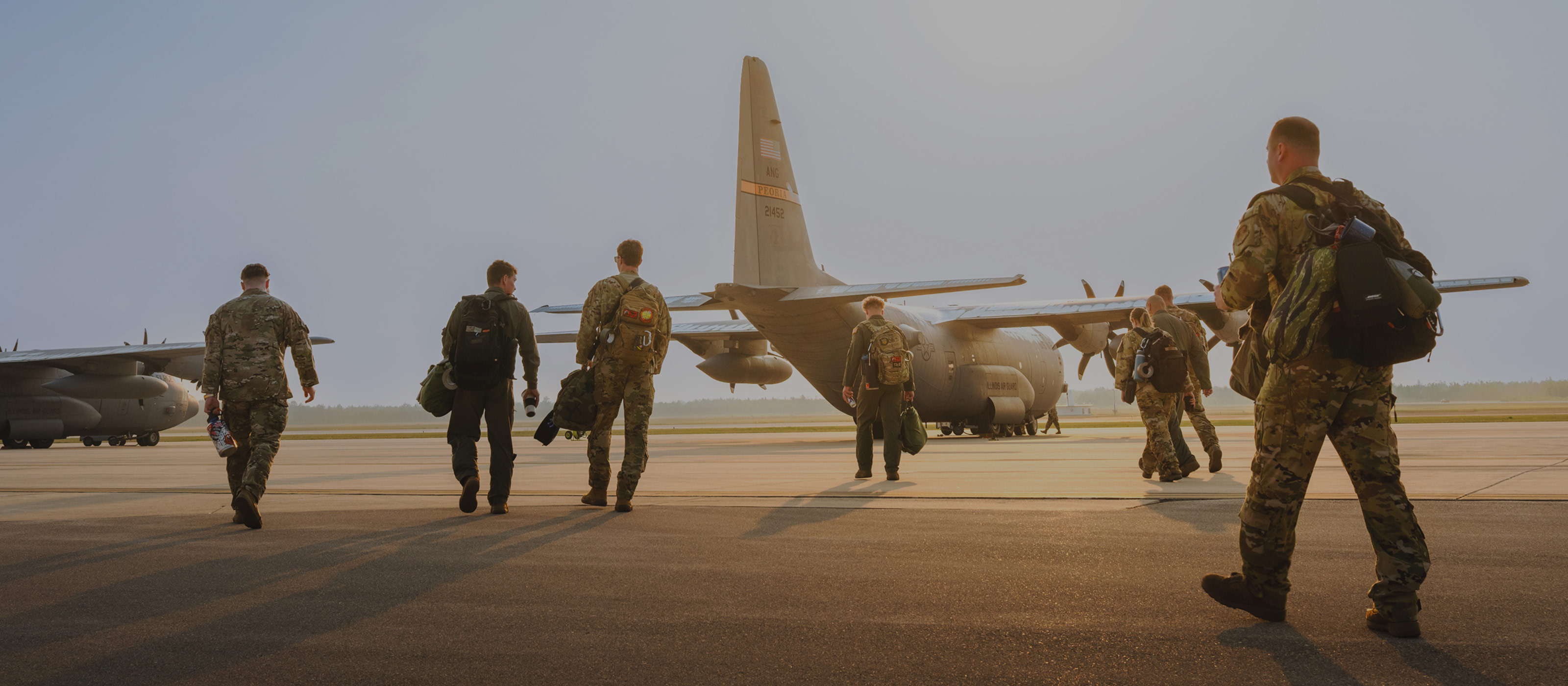 Airmen walking toward plane