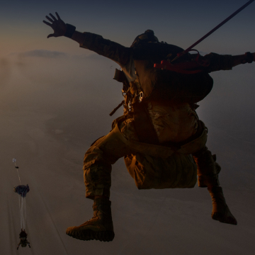 Airman jumping from airplane
