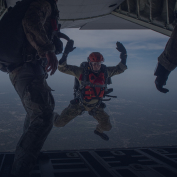 Pararescue Airmen jumping from plane