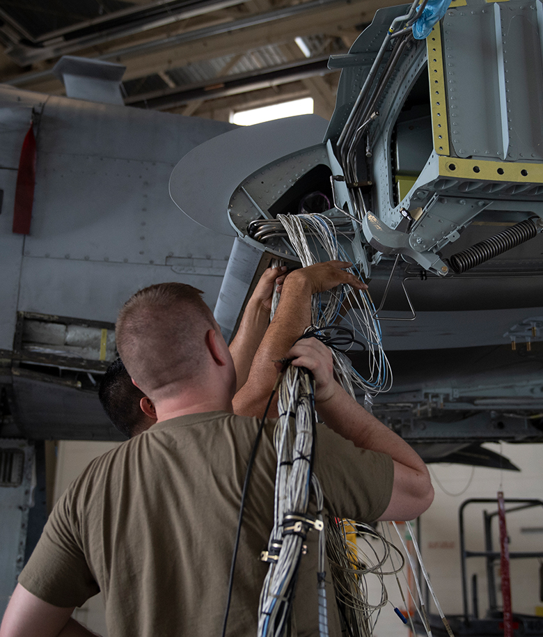 airmen performing maintenance work