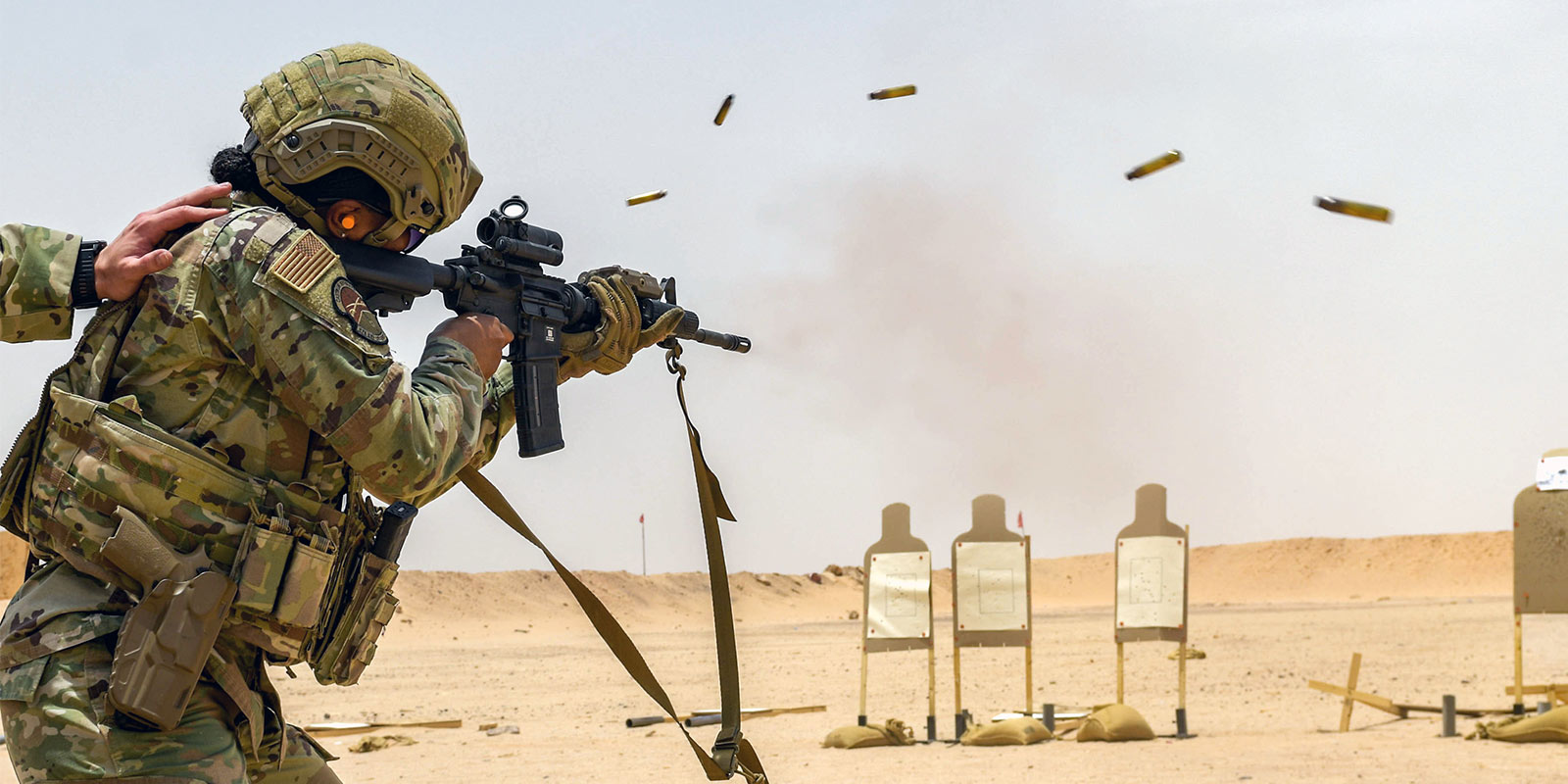 Airman firing a M4 Carbine Assault Rifle