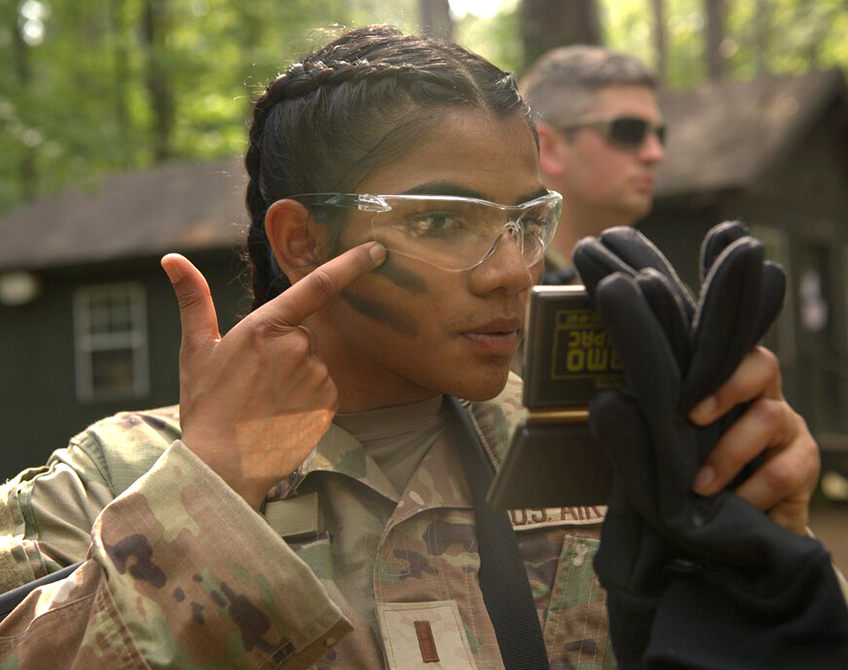 Officer applying face paint