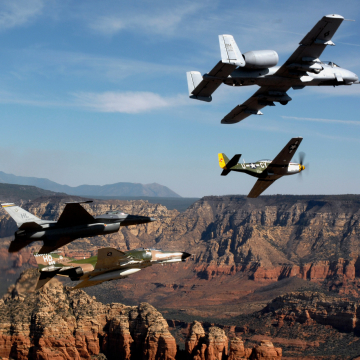 Air National Guard planes flying over canyon